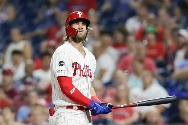 Phillies Bryce Harper looks up after striking out against the San Diego Padres on Saturday.