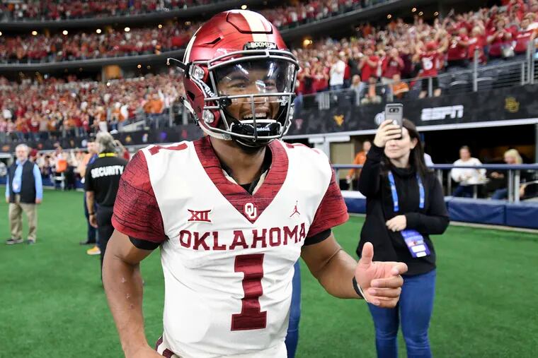 Kyler Murray celebrates after Oklahoma beat Texas in the Big 12 championship game on Saturday.