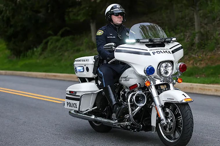 Officer Daniel McFarland on a new Tredyffrin Township Police motorcycle on Monday, May 5, 2014. (  Steven M. Falk / Staff Photographer )