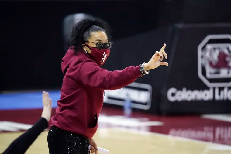 South Carolina head coach Dawn Staley communicates with players during the first half of an NCAA college basketball game against Missouri Thursday, Feb. 11, 2021, in Columbia, S.C. (AP Photo/Sean Rayford)