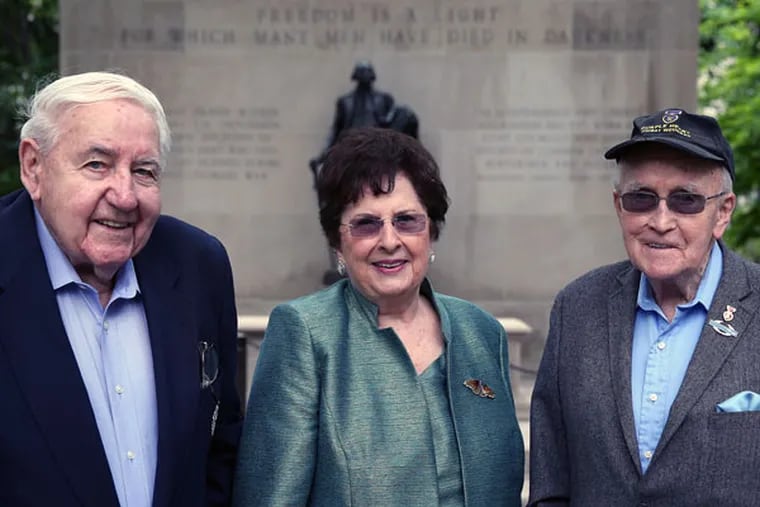 Seeking a monument in Washington Square to the Battle of the Bulge are battle veterans Stanley Wojtusik (left) and Norbert McGettigan, with his wife, Doreen. They need permits and funds for the memorial, estimated at up to $140,000. (DAVID MAIALETTI / Staff Photographer)