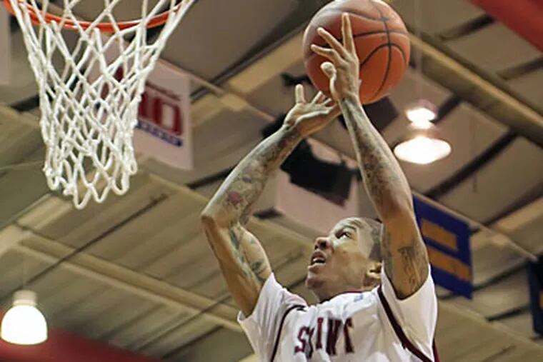 Junior Carl Jones scored a game-high 29 points for St. Joe's, 20 of which came after half-time. (Michael Bryant/Staff Photographer)