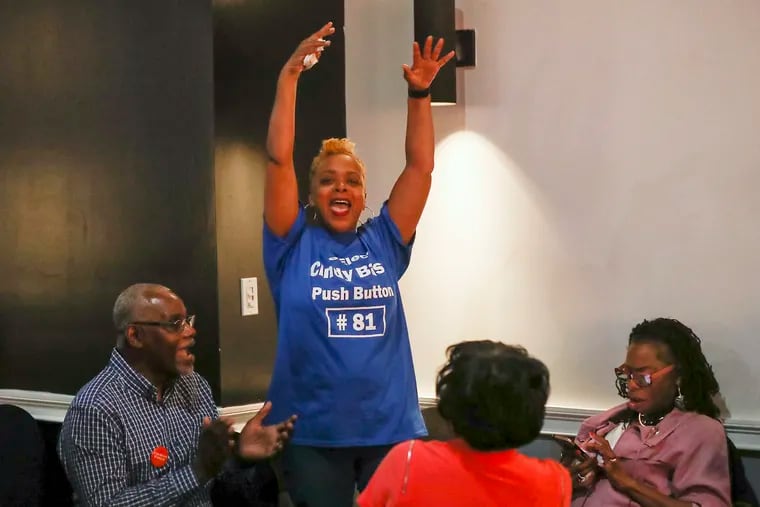 City Councilmember Cindy Bass (center) cheers after a shoutout from the D.J. at an election night watch party for Democratic candidate for mayor Cherelle Parker. Bass won a close primary race.