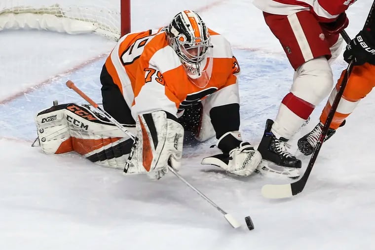 Flyers' goalie Carter Hart makes a stop against the Red Wings during the second period Tuesday at the Wells Fargo Center.
