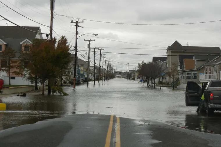 Floodwaters from the hurricane cover much of Glenwood Avenue in West Wildwood on Tuesday. Still, officials there said they expected the damage to be worse.