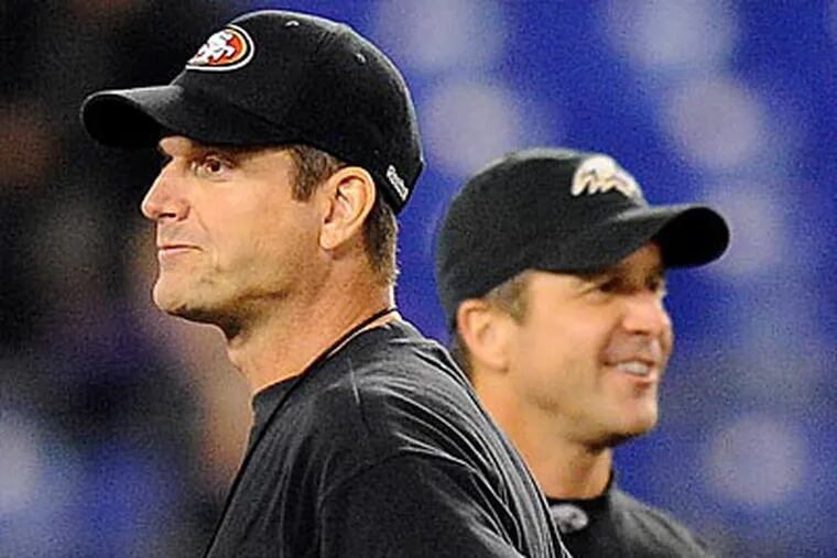 If the 49ers and Ravens win on Sunday, brothers Jim and John Harbaugh will square off in the Super Bowl. (Nick Wass/AP)