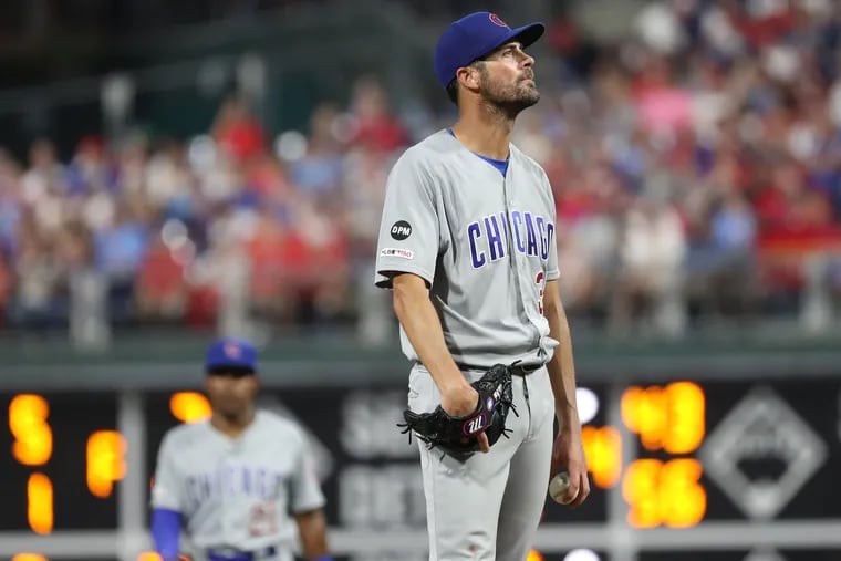 Cole Hamels of the Cubs reacts as he realizes Cubs Manager Joe Maddon is pulling him from the game against the Phillies at Citizens Bank Park on Aug. 14, 2019.
