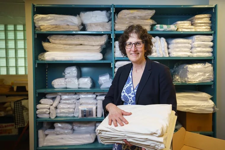 Janet Wischnia, director of American Blossom Linens, at the headquarters of family-owned company ATD-American in Wyncote.