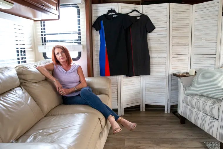 Tonya Osborne, with two of her flight attendant uniforms in the background, in her RV in Rockledge, Fla., on Feb. 5, 2020. (Photo/Willie J. Allen Jr.)