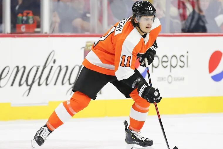 Travis Konecny, shown here during the preseason, took a puck off the right foot at Friday's practice and had to leave early.