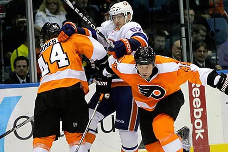 The Flyers just barely avoided losing to the Islanders, the NHL's worst team, on Sunday. (Seth Wenig/AP)