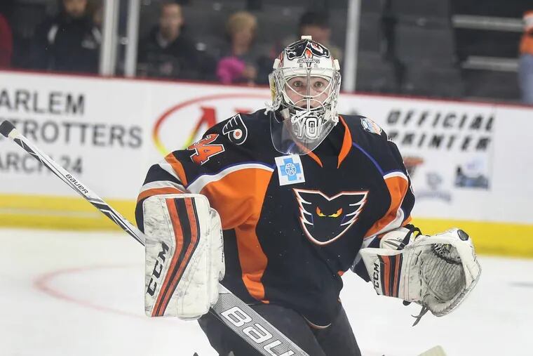 Phantoms goalie Alex Lyon, shown in a game last season, was spectacular in Wednesday’s marathon in Charlotte, the longest game in AHL history.