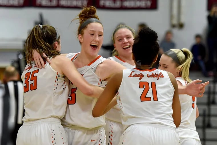 Cherokee's Alexa Therien (second from left) is joined by teammates (from left) Ava Therien, Katie Cummiskey, Kennedy Wilburn and Lyndsay Craig after a championship win.