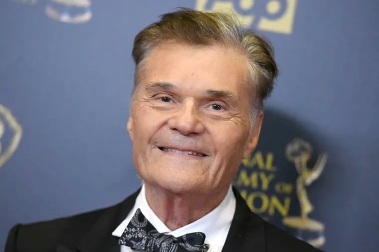 Fred Willard posing for a photo at the 2015 Daytime Emmy Awards.