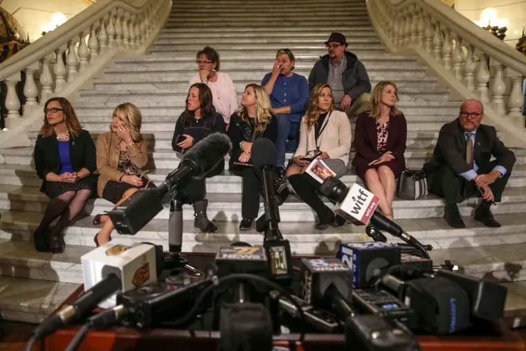 Waiting for a press conference, clergy sexual abuse victims gather in the Capitol late Wednesday night October 17, 2018, after the state Senate rejected a measure that would have allowed lawsuits against perpetrators and institutions such as the Catholic Church.