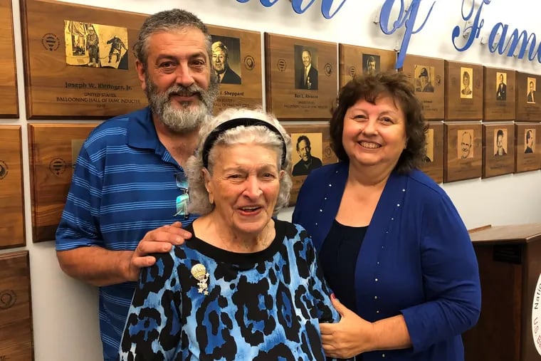 Eleanor Vadala center is flanked by her niece, Linda, and nephew, Earl, at her 2019 induction into the U.S. Ballooning Hall of Fame.