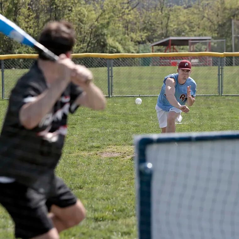 The Phillies' Colin Pollag delivers a pitch to the Royals' Zane Johnston during a Wiffle ball game on April 28 at Catania Park in Ridley Park.
