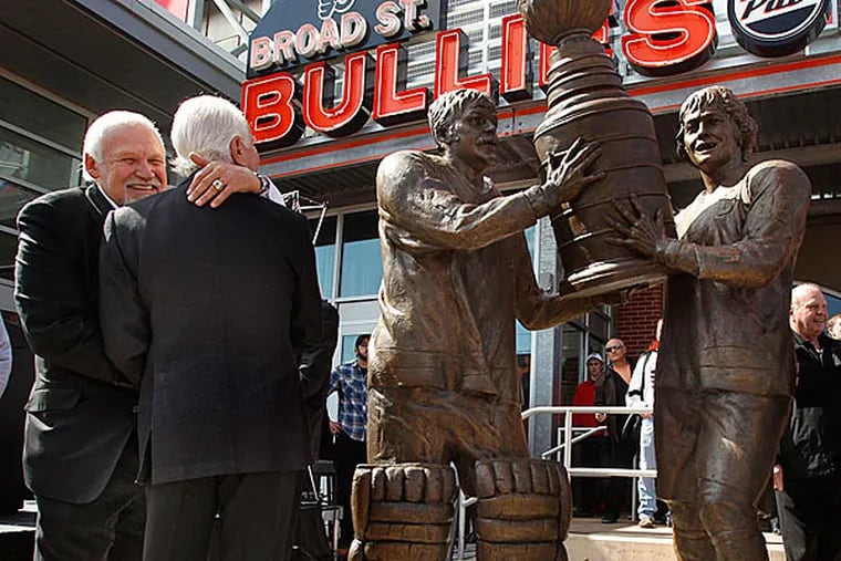 The statue of Bernie Parent and Bobby Clarke was unveiled on Saturday. (Ron Cortes/Staff Photographer)