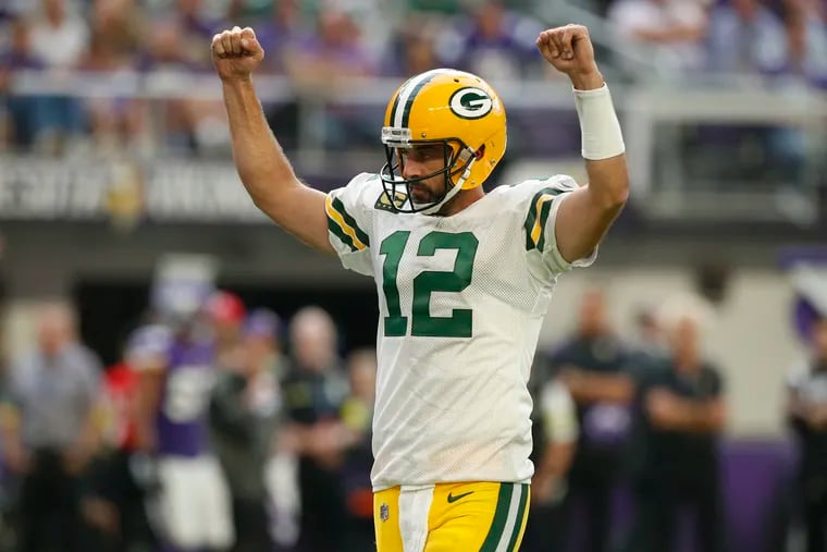 Aaron Rodgers celebrates a touchdown during the third quarter in the game against the Minnesota Vikings at U.S. Bank Stadium on September 11, 2022 in Minneapolis, Minnesota. (Photo by David Berding/Getty Images)