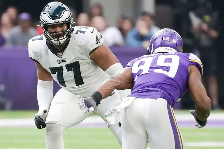 Eagles offensive tackle Andre Dillard watches Minnesota Vikings defensive end Danielle Hunter during the third quarter Sunday. Dillard replaced Eagles offensive tackle Jason Peters when Peters suffered a knee injury.