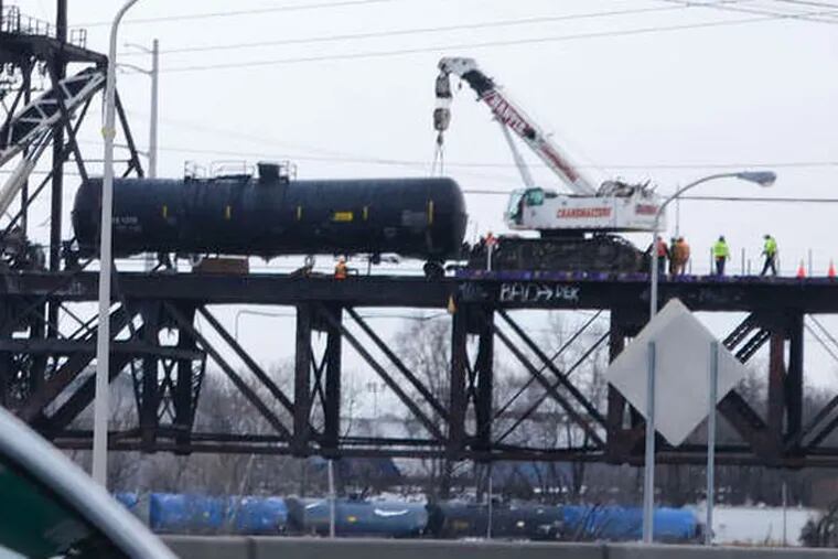 The Schuylkill Arsenal Bridge, where rail tank cars carrying crude oil derailed Jan. 20. There have been problems with crude being carried by rail. (David M Warren / Staff Photographer)