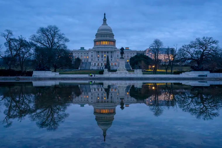 The Capitol is seen under early morning skies in Washington, Thursday, Dec. 20, 2018.