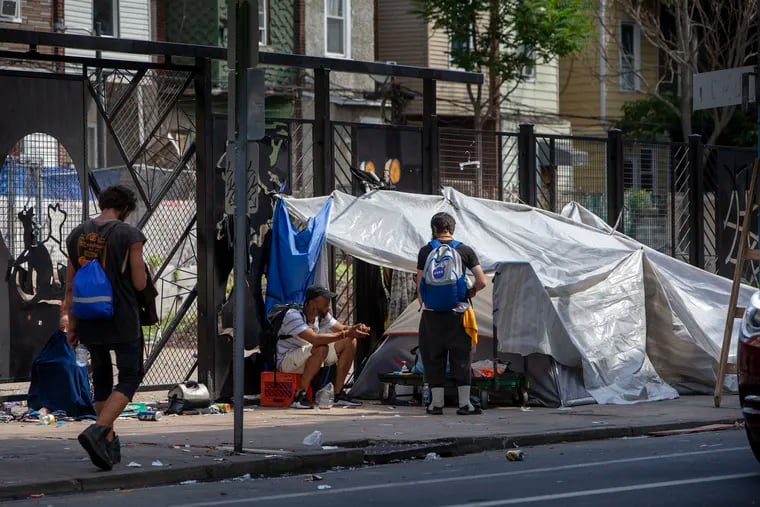 Tents and makeshift structures still occupy Kensington Avenue. The city posted signs warning: “You are not authorized ... in the neighborhood known as Kensington to erect tents or other structures, or to otherwise encamp or stay, at this location.”