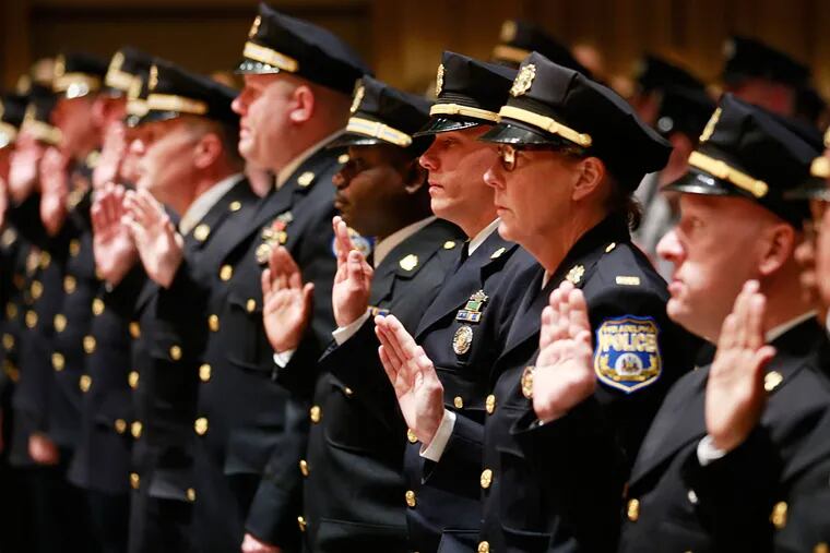 At a ceremony held at the Temple Performing Arts Center, 126 Philadelphia Police Department  officers are promoted to various ranks.