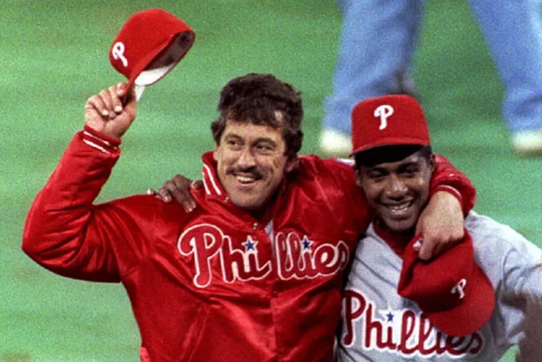 Coach John Vukovich (left), with Mariano Duncan in 1993, was one of the most respected coaches in team history. He spent 31 years with the Phillies as a player, coach, interim manager, and front office adviser. He died at age 59 of brain cancer in 2007.