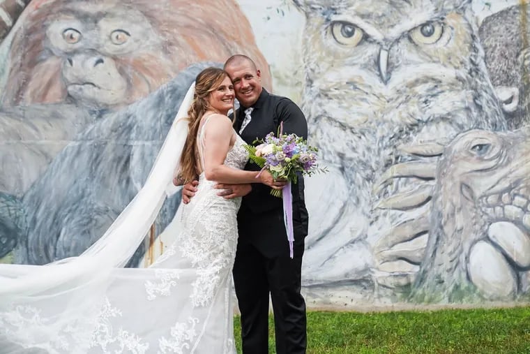 Katharine "Katie" Walston and Matthew "Fred"  Frederick were married at the Elmwood Park Zoo.