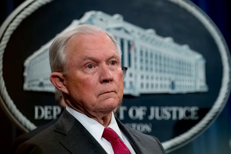 FILE - In this Oct. 16, 2018, file photo, then-Attorney General Jeff Sessions attends a news conference at the Justice Department in Washington.