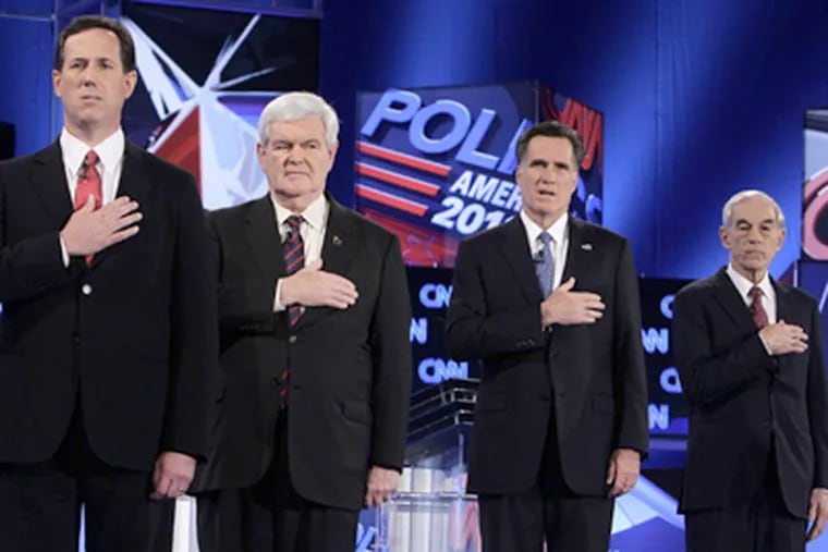 At the GOP debate in January in Florida: (from left) Rick Santorum, Newt Gingrich, Mitt Romney, and Ron Paul. (Paul Sancya / Associated Press)