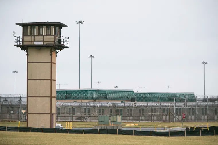 FILE - This Feb. 1, 2017, file photo shows the James T. Vaughn Correctional Center near Smyrna, Del. A riot at the prison resulted in the murder of Lt. Steven Floyd, injuries to Correctional Officers Winslow Smith and Joshua Wilkinson, and the kidnapping of counselor Patricia May. (Suchat Pederson/The Wilmington News-Journal via AP, File)