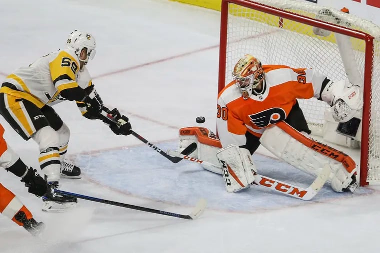 Flyers' goalie Michal Neuvirth can't stop the goal by  Penguins' Jake Guentzel during the third period of game six in round one of the NHL Playoffs at the Wells Fargo Center, Sunday,  April 22, 2018. The Penguins beat the Flyers 8-5 and win the series.