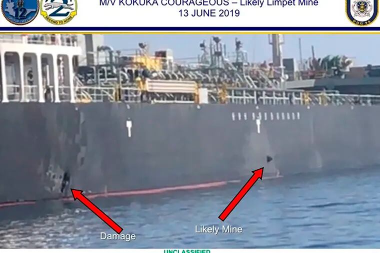 This June 13, 2019, image released by the U.S. military's Central Command, shows damage and a suspected mine on the Kokuka Courageous in the Gulf of Oman near the coast of Iran. The U.S. military on Friday, June 14, 2019, released a video it said showed Iran's Revolutionary Guard removing an unexploded limpet mine from one of the oil tankers targeted near the Strait of Hormuz, suggesting the Islamic Republic sought to remove evidence of its involvement from the scene. (U.S. Central Command via AP)