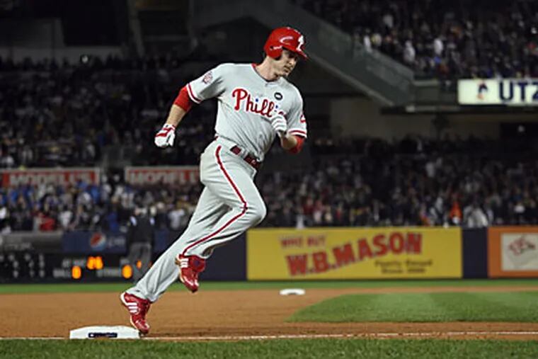 Chase Utley rounds third after hitting his second home run of the game off CC Sabathia. (Yong Kim / Staff Photographer)