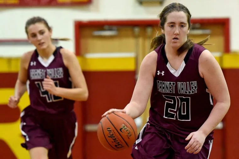 Emily McAteer scored four points to become the leading scorer in girls' basketball at Garnet Valley.