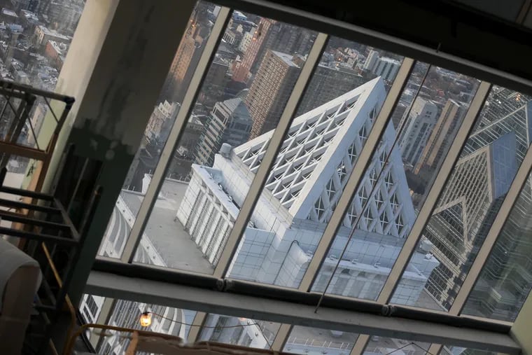 The BNY Mellon Center is reflected in an array of shiny panels hanging from the ceiling of the 60th floor, which will be part of the Four Seasons hotel, the sky-high lodgings coming online this year at the Comcast Technology Center. It's just one of six new hotels opening in 2019, Visit Philadelphia said.