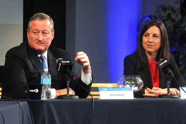 Mayoral candidates Democrat Jim Kenney and his Republican opponent Melissa Murray Bailey listen to a question from Kevin McCorry and Katie Colaneri of WHYY as the two face off in front of a radio studio audience October 12, 2015.