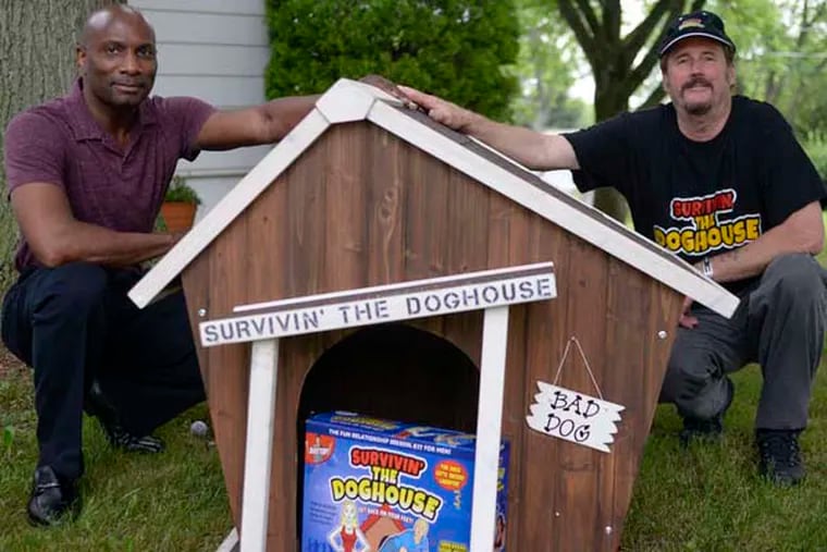Earl McCall (left) and his business partner, Noel Wilkins, have made a relationship survival kit for men with an accompanying book. The &quot;Survivin' the Doghouse&quot; kit sells for $34.95.  ( BEN MIKESELL / Staff Photographer )