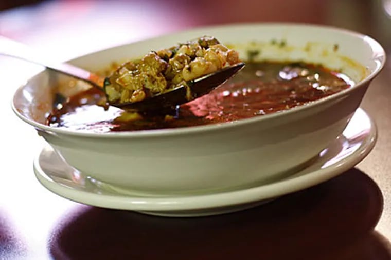 One tasty trio: The guacamole platter, left, eschews the typical blandness for rustic zest; flan, center, is a cool, creamy caramel; and the special Sunday pozole is a dish worth the trip. (ERIC MENCHER / Staff Photographer)
