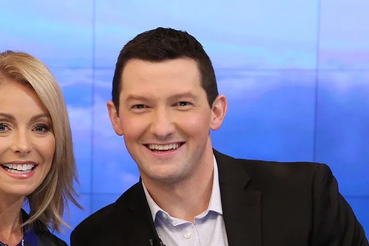 Richard Curtis poses with his ‘former’ cohost Kelly Ripa on Live with Kelly. Curtis, a Perkasie native, won a contest to cohost with Ripa. He’ll now have his own show on Fox29