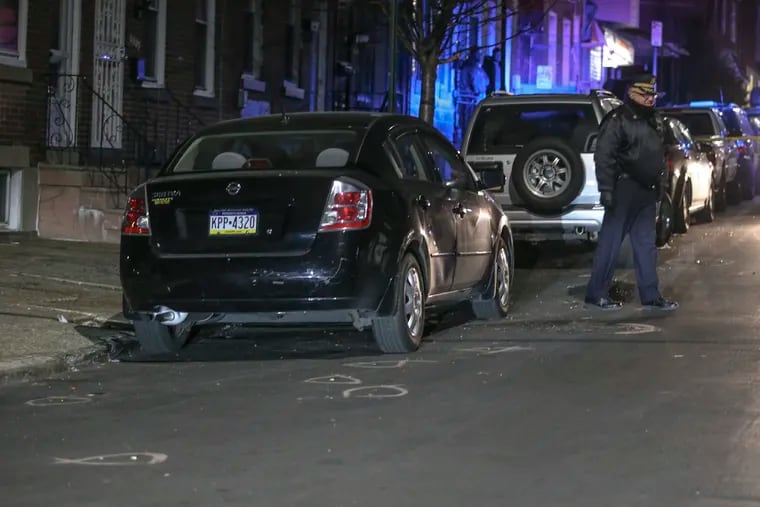 Police at the scene of a carjacking at Cornwall and H Streets last month, where a pizza delivery man shot an alleged carjacker. The victim had a license to carry a firearm, police said.