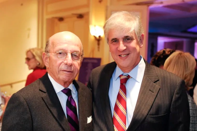 Ronald Rubin (left) in 2011 with Paul Levy, the first executive director of the Center City District business association. Rubin, who died Monday, founded the group in the early 1990s and chaired the board when it hired Levy.