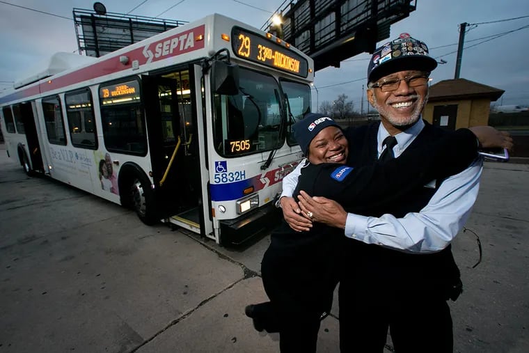 SEPTA bus driver Sharon Morris with Eugene "Smitty" Smith at 33rd and Dickinson in south Philadelphia. Smith, 67, a SEPTA bus driver on the Rt 29 bus, is retiring at the end of 2014. ( ALEJANDRO A. ALVAREZ / STAFF PHOTOGRAPHER )