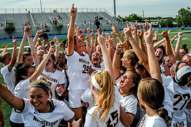 The Moorestown girls celebrate after beating Summit to win the Group 3 state championship on June 2. 