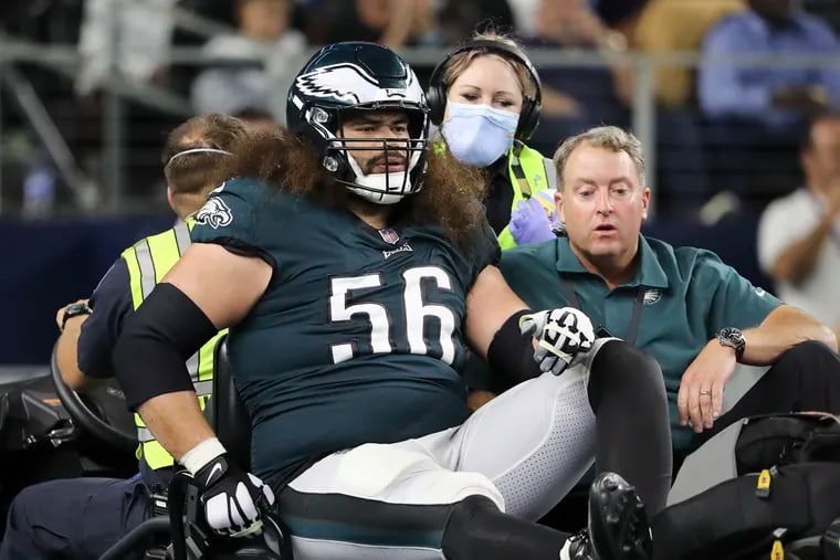 Eagles offensive guard Isaac Seumalo gets carted off the field after getting injured during the fourth quarter against the Dallas Cowboys on Monday, September 27, 2021 in Arlington, Texas.