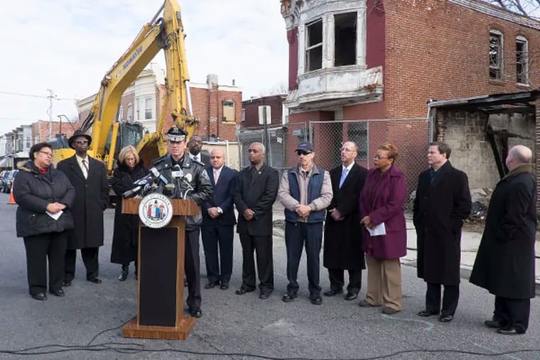 Camden County Police Chief Scott Thomson addresses a crowd, stressing the importance of a campaign to tear down 600 abandoned buildings in blighted areas of Camden, on Tuesday, Jan. 20, 2015. (ED HILLE / Staff Photographer )