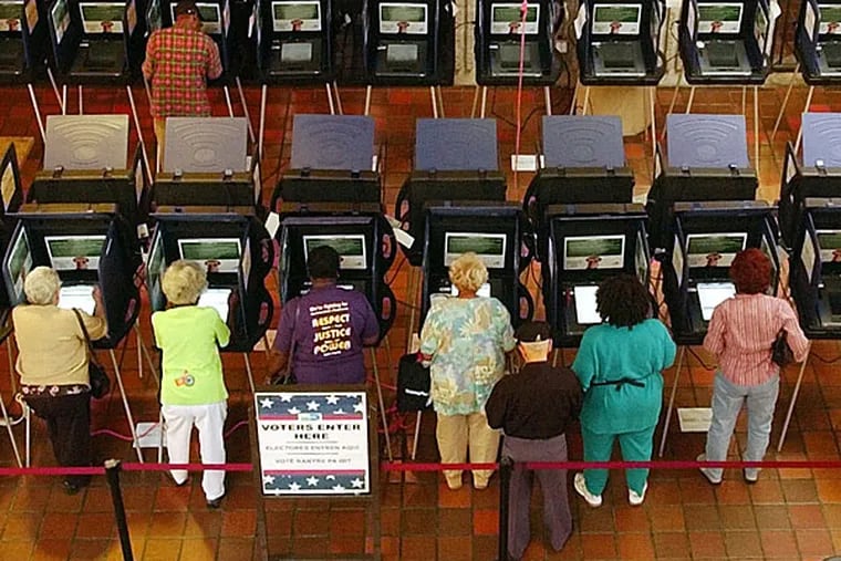 Voters in Miami cast ballots in October 2004, when Florida began allowing early voting. (J. PAT CARTER / Associated Press)