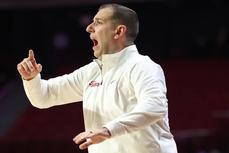 Coach Adam Fisher of Temple on the sidelines during their loss to East Carolina at the Liacouras Center on Jan. 10, 2024.